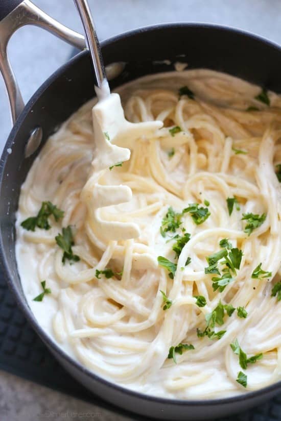 This Garlic Parmesan Spaghetti has browned butter and garlic in its thick and creamy parmesan sauce, for a super flavorful pasta dinner that will have you licking the plate clean.