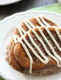 Churro French Toast - Thick slices of French bread are battered and pan fried, then dipped in cinnamon-sugar, and topped with a buttery cream cheese frosting. Delicious!