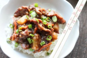 This Slow Cooker Mongolian Beef & Pineapple is a little spicy, a little sweet, full of authentic Asian flavors, and is so easy to make!