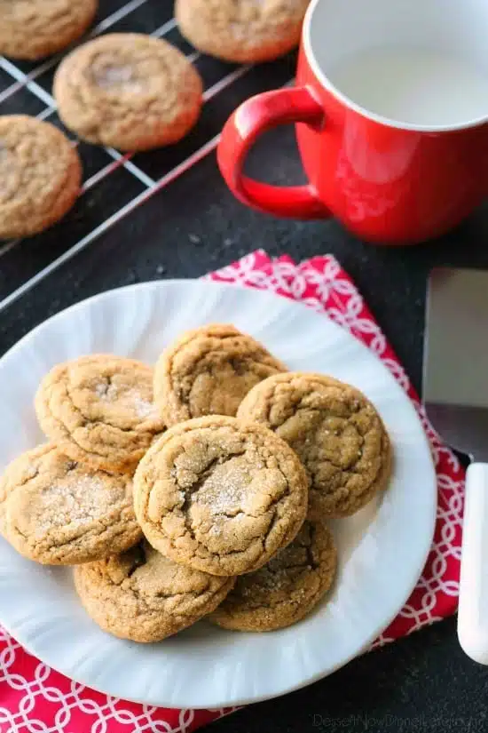 These Soft Baked Gingersnap Cookies are thick and chewy, and full of rich molasses, ginger, and spices for a wonderful Christmas cookie everyone will love!