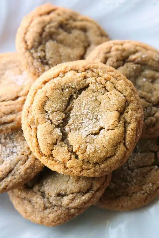 These Soft Baked Gingersnap Cookies are thick and chewy, and full of rich molasses, ginger, and spices for a wonderful Christmas cookie everyone will love!