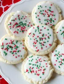 Meltaway cookies are a soft, lightly sweet shortbread cookie that literally melts away in your mouth. Top it with a thin glaze and red and green sprinkles for a festive Christmas cookie treat.