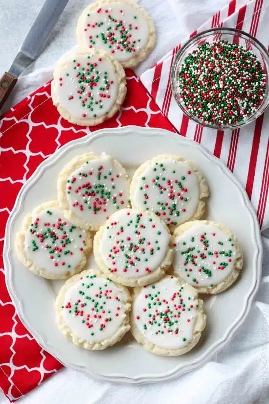 Meltaway cookies are a soft, lightly sweet shortbread cookie that literally melts away in your mouth. Top it with a thin glaze and red and green sprinkles for a festive Christmas cookie treat.