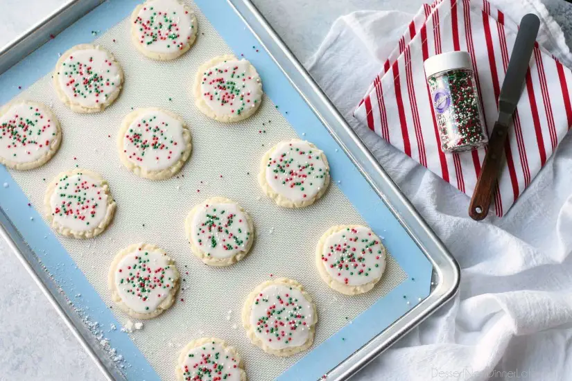Meltaway cookies are a soft, lightly sweet shortbread cookie that literally melts away in your mouth. Top it with a thin glaze and red and green sprinkles for a festive Christmas cookie treat.