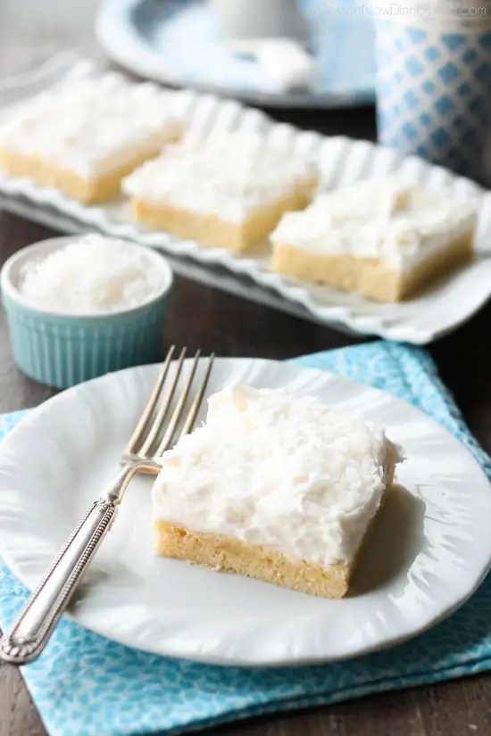 These Coconut Sugar Cookie Bars have lots of delicious coconut flavor from the crust, to the frosting, and the shredded coconut on top. Plus, they are super soft, chewy, and easy to make!