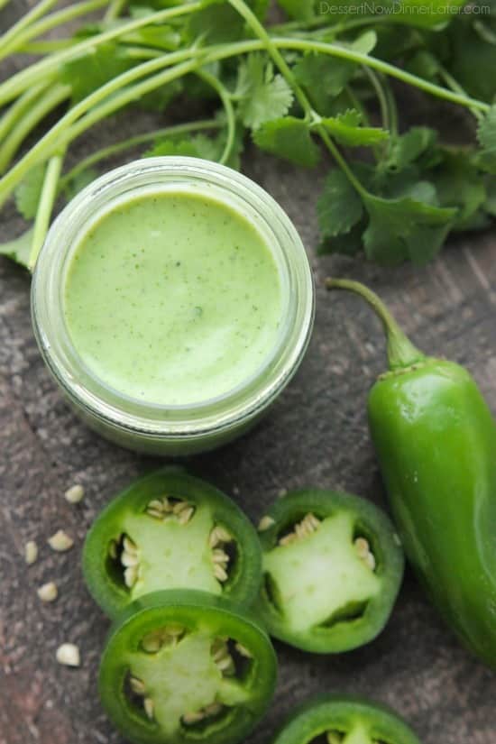 This Cafe Rio Style Cilantro Ranch Dressing is tangy, super creamy, and has a just the right kick of jalapeño. You'll want to put it on everything!