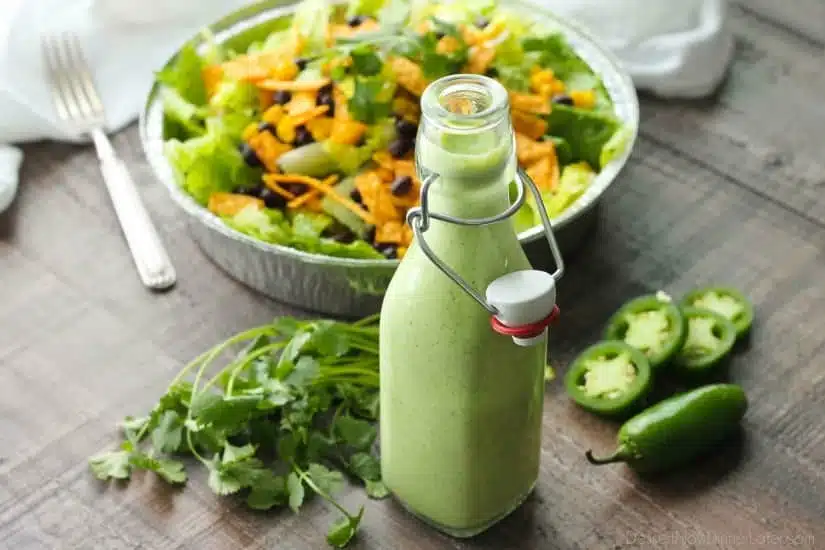 This Cafe Rio Style Cilantro Ranch Dressing is tangy, super creamy, and has a just the right kick of jalapeño. You'll want to put it on everything!