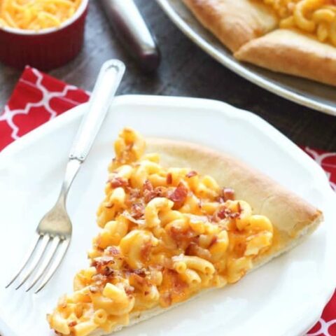 Mac and Cheese Pizza combines two tasty dinners into one incredible meal. It's so easy, the kids can make it! Top it with bacon for extra deliciousness!