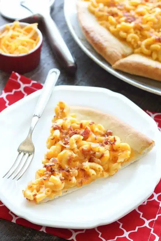 Mac and Cheese Pizza combines two tasty dinners into one incredible meal. It's so easy, the kids can make it! Top it with bacon for extra deliciousness!