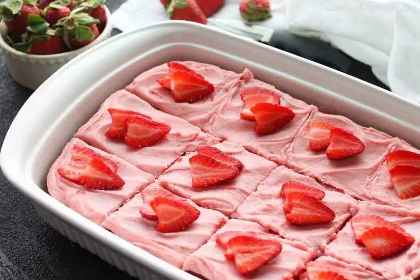 This strawberry cake uses fresh strawberries and flavored gelatin for a super flavorful strawberry sheet cake that will feed a crowd. It's really easy, and incredibly moist too!