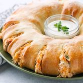 This Bacon Chicken Ranch Sandwich Ring makes a great dinner or party appetizer! It's meaty, cheesy, and full of flavor!