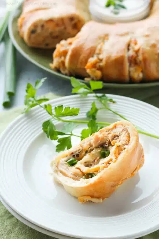 This Bacon Chicken Ranch Sandwich Ring makes a great dinner or party appetizer! It's meaty, cheesy, and full of flavor!