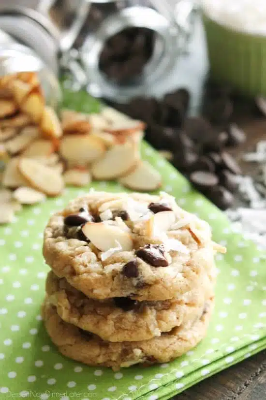 Almond Coconut Chocolate Chip Cookies are loaded with sliced almonds, shredded coconut, chocolate chips and flavored extracts for an Almond Joy inspired twist on the traditional chocolate chip cookie.