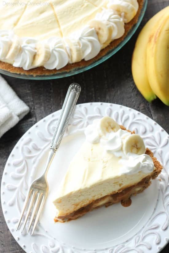 This Caramel Banana Cream Pie is heavenly and so easy to make! With caramel and freshly sliced bananas on the bottom of a homemade graham cracker crust, and a rich, creamy pudding layer on top, this banana cream pie is sure to be your new favorite dessert!