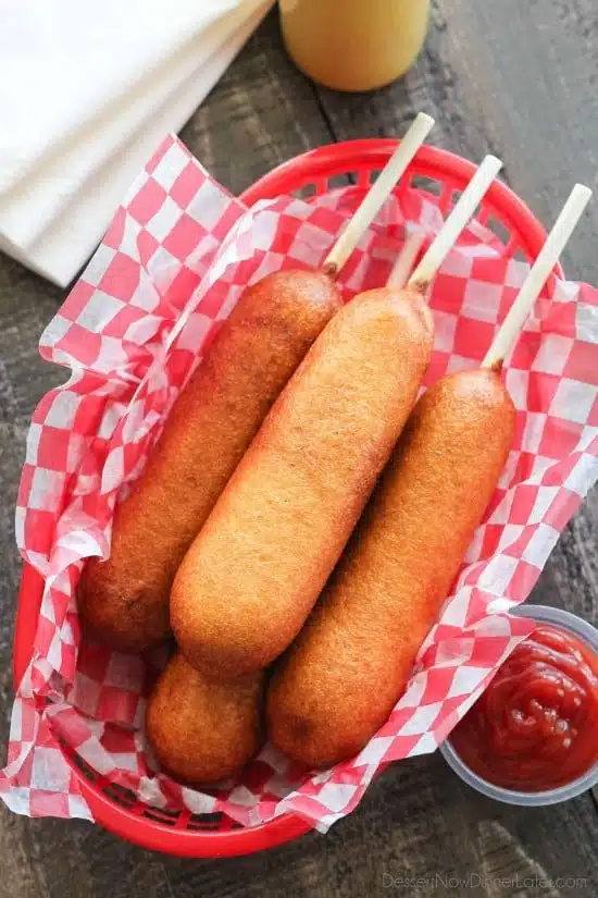 These homemade corn dogs are lightly sweet, crisp, and hand-dipped just like the ones at Corn Dog Castle in California Adventure, Disneyland. They freeze well too!