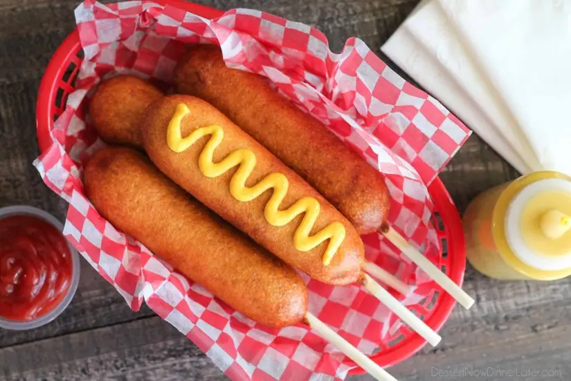 These homemade corn dogs are lightly sweet, crisp, and hand-dipped just like the ones at Corn Dog Castle in California Adventure, Disneyland. They freeze well too!
