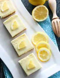 Lemon Cheesecake Bars are creamy and lightly sweet with a bright and tangy lemon flavor throughout for a wonderful spring time dessert.