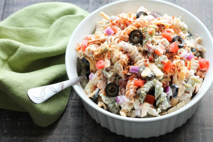 Bacon Ranch Pasta Salad is perfect for BBQ's and all your summer get togethers. It's loaded with pasta, bacon, cheese, olives, tomatoes, and onion - then tossed with a simple, creamy ranch dressing. 