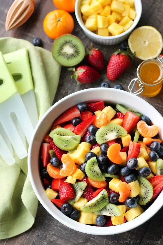 This summer fruit salad is as colorful as a rainbow, and is tossed in a reduced honey orange glaze for the perfect amount of added sweetness and flavor. Great for barbecues, potlucks, and picnics!