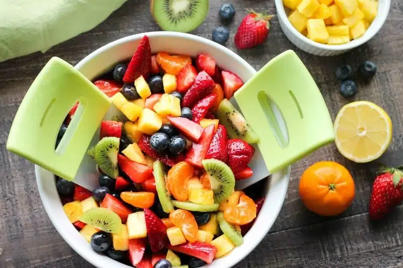 This summer fruit salad is as colorful as a rainbow, and is tossed in a reduced honey orange glaze for the perfect amount of added sweetness and flavor. Great for barbecues, potlucks, and picnics!