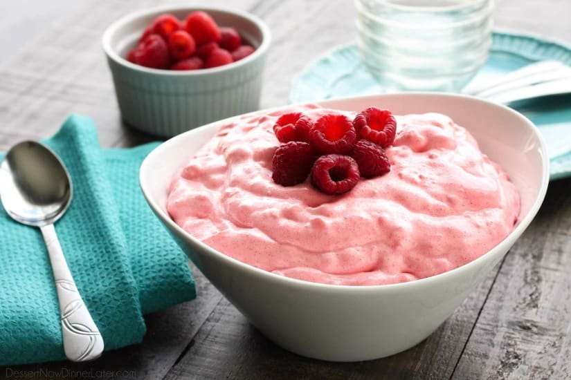 Raspberry Fluff Fruit Salad is the jello salad that everyone loves! With only 4-ingredients and 5 minutes prep, this is the perfect sweet side dish for your next potluck, picnic, or BBQ!