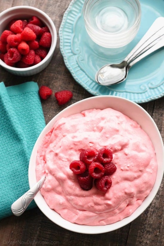 Raspberry Fluff Fruit Salad is the jello salad that everyone loves! With only 4-ingredients and 5 minutes prep, this is the perfect sweet side dish for your next potluck, picnic, or BBQ!