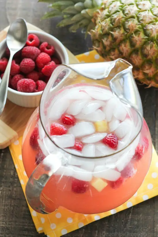 Raspberry Pineapple Punch is fruity, fizzy, and family friendly. Great for your summer party or baby shower.
