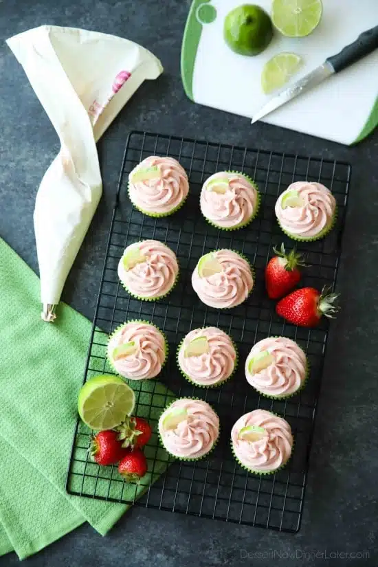 Strawberry Lime Cupcakes are perfect for summer, with a tangy lime cupcake base and sweet strawberry frosting they are sure to be loved by all. A family-friendly, non-alcoholic alternative to strawberry margarita cupcakes!