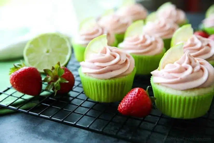 Strawberry Lime Cupcakes are perfect for summer, with a tangy lime cupcake base and sweet strawberry frosting they are sure to be loved by all. A family-friendly, non-alcoholic alternative to strawberry margarita cupcakes!