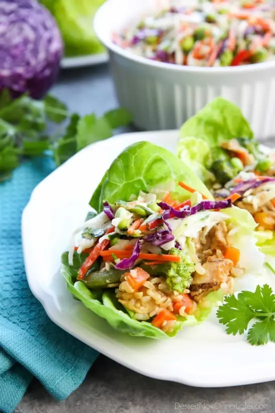 Whip up these Teriyaki Chicken Lettuce Wraps with Asian Slaw in no time for an easy family dinner with insanely tasty flavors!