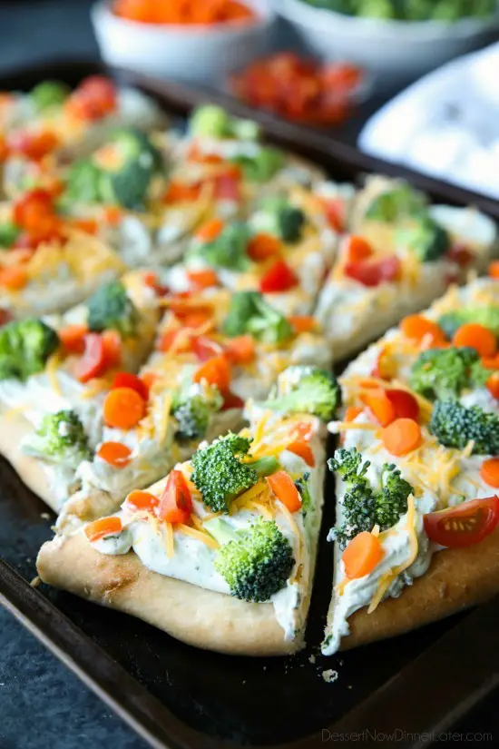 This cold vegetable pizza is the ultimate party appetizer for summer potlucks. With a fresh baked crust, creamy ranch spread, and crunchy fresh veggies, everyone will be coming back for seconds!