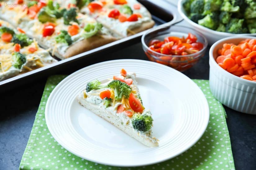 This cold vegetable pizza is the ultimate party appetizer for summer potlucks. With a fresh baked crust, creamy ranch spread, and crunchy fresh veggies, everyone will be coming back for seconds!