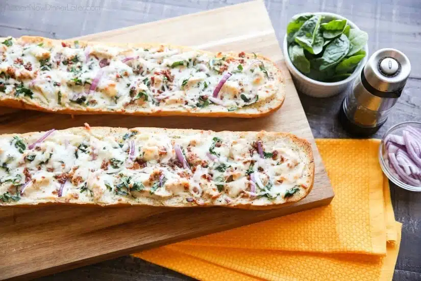 Chicken Alfredo Garlic Bread Pizza is a quick and easy dinner with loads of flavor! Pick up a loaf of French bread and make this tonight!