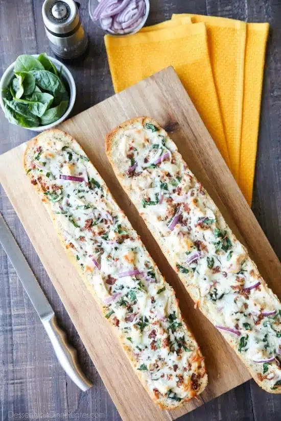 Chicken Alfredo Garlic Bread Pizza is a quick and easy dinner with loads of flavor! Pick up a loaf of French bread and make this tonight!