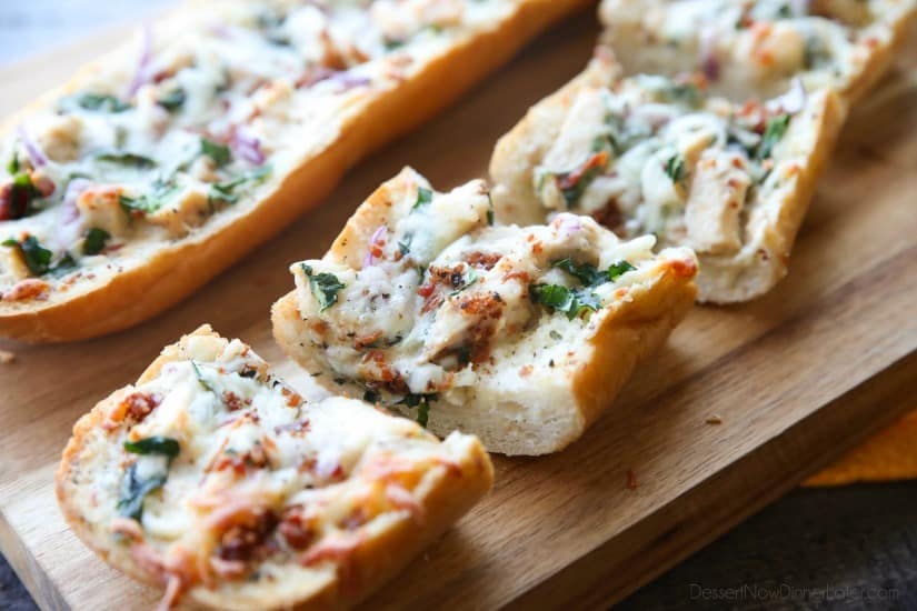 Chicken Alfredo Garlic Bread Pizza is a quick and easy dinner with loads of flavor! Pick up a loaf of French bread and make this tonight!