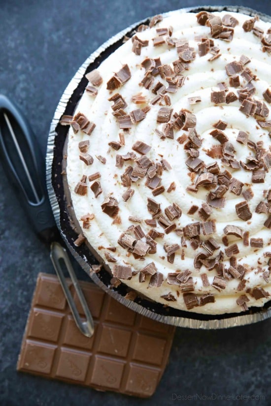 This no bake cheesecake has two layers of light and smooth cheesecake -- creamy vanilla and decadent chocolate, layered inside a chocolate cookie crust, and topped with sweetened whipped cream and chocolate shavings. It's an easy and delicious summer dessert!