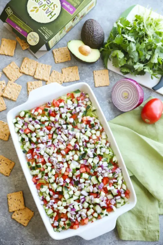 This Skinny Seven Layer Dip is loaded with fresh veggies, and makes a great appetizer or snack for any party or barbecue!