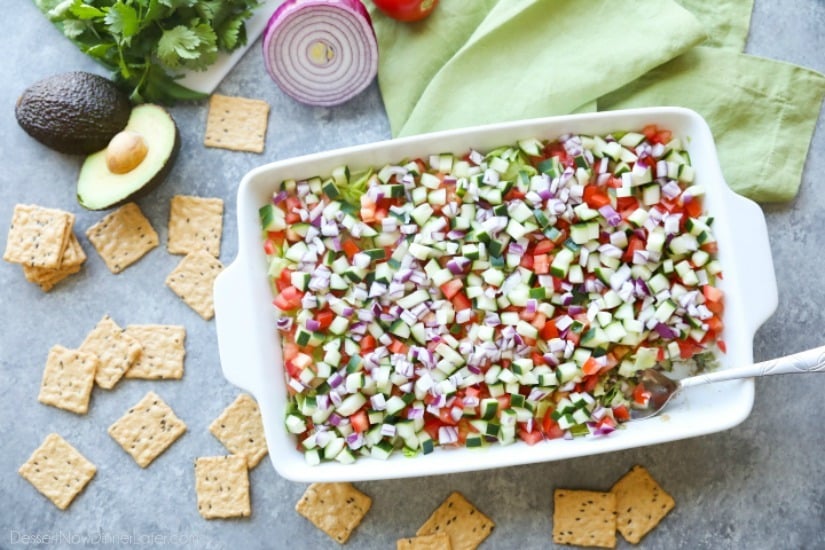 This Skinny Seven Layer Dip is loaded with fresh veggies, and makes a great appetizer or snack for any party or barbecue!