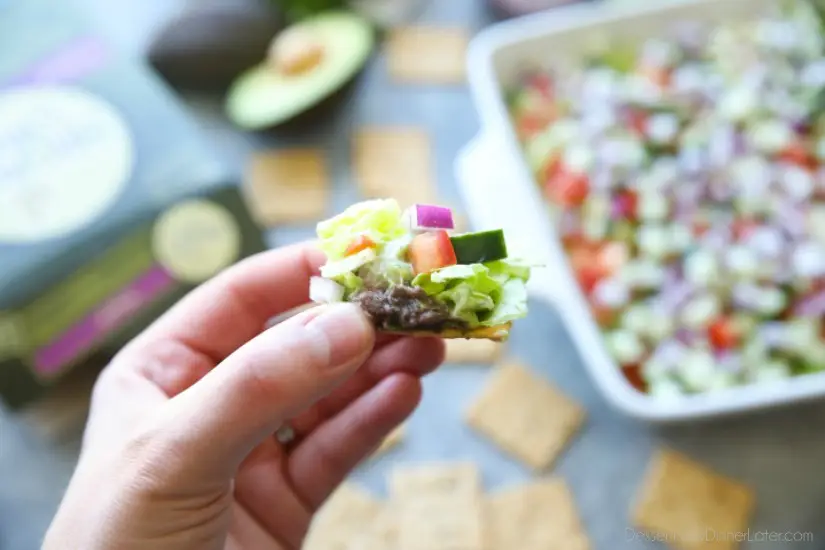 This Skinny Seven Layer Dip is loaded with fresh veggies, and makes a great appetizer or snack for any party or barbecue!