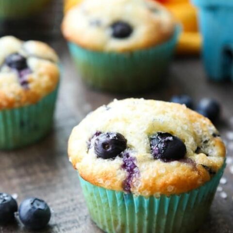 These Blueberry Muffins are so easy to make! With plump blueberries throughout and coarse sugar sprinkled on top, you'll love nibbling on these tasty muffins for breakfast (or brunch)!