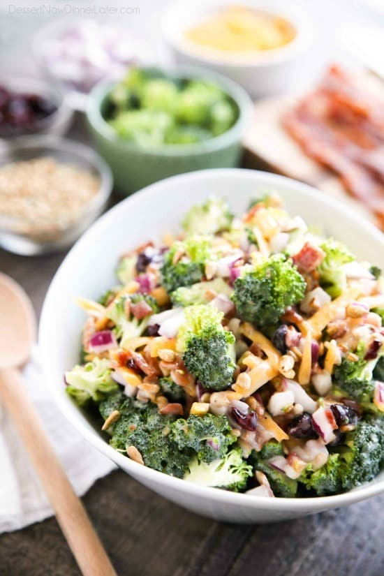 This Broccoli Salad recipe is our favorite! It's creamy, sweet, and salty, with the just the right amount of crunch. A great side dish for barbecues, potlucks, picnics or parties. Everyone loves this salad!