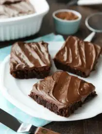 Chocoholics NEED these Frosted Fudge Brownies! Super fudgy homemade brownies are topped with a smooth and creamy fudge chocolate frosting for ultimate chocolate pleasure. Great for lunch box treats, dessert, or anytime!