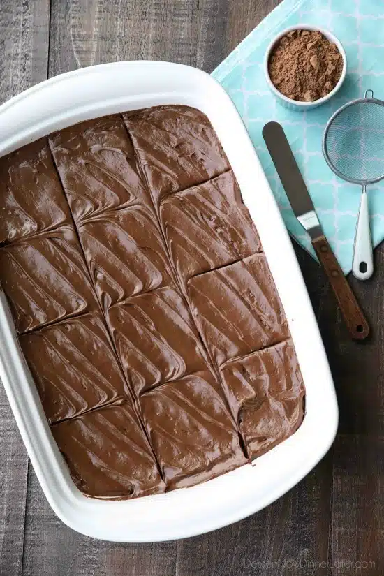 Chocoholics NEED these Frosted Fudge Brownies! Super fudgy homemade brownies are topped with a smooth and creamy fudge chocolate frosting for ultimate chocolate pleasure. Great for lunch box treats, dessert, or anytime!