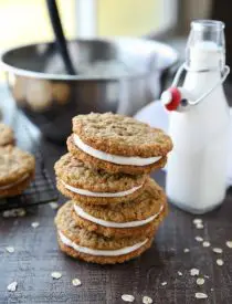 Oatmeal Cream Pies - Soft and chewy oatmeal cookies filled with vanilla buttercream frosting. Inspired by Little Debbie, but made fresh and delicious in your own home!