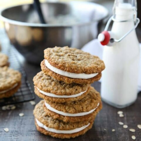 Oatmeal Cream Pies - Soft and chewy oatmeal cookies filled with vanilla buttercream frosting. Inspired by Little Debbie, but made fresh and delicious in your own home!
