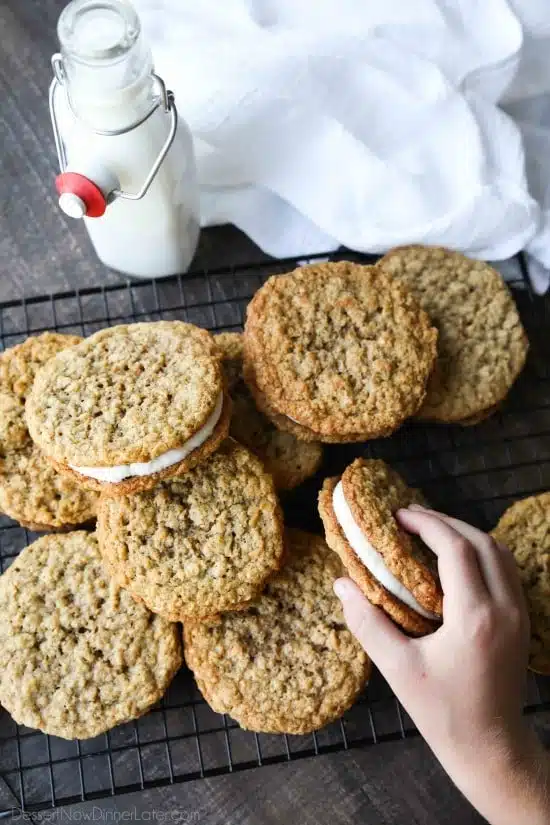 Oatmeal Cream Pies - Soft and chewy oatmeal cookies filled with vanilla buttercream frosting. Inspired by Little Debbie, but made fresh and delicious in your own home!