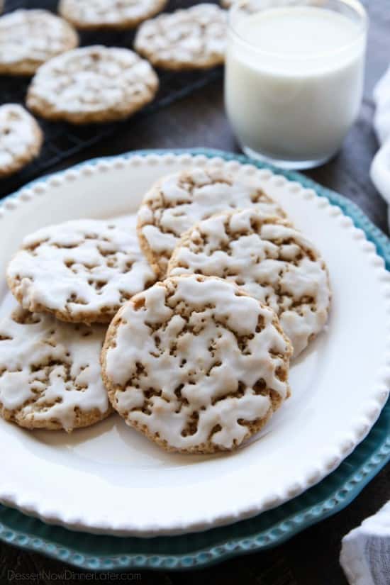 Old fashioned Iced Oatmeal Cookies are crisp on the outside, soft and chewy on the inside, with warm spices, and a light glaze on top. Perfect with a cold glass of milk!