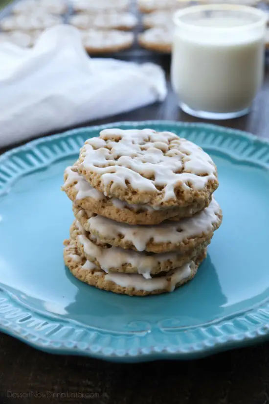 Old fashioned Iced Oatmeal Cookies are crisp on the outside, soft and chewy on the inside, with warm spices, and a light glaze on top. Perfect with a cold glass of milk!