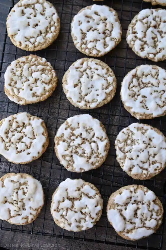 Old fashioned Iced Oatmeal Cookies are crisp on the outside, soft and chewy on the inside, with warm spices, and a light glaze on top. Perfect with a cold glass of milk!