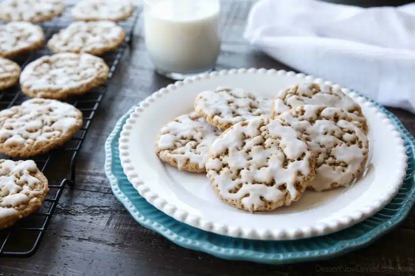 Old fashioned Iced Oatmeal Cookies are crisp on the outside, soft and chewy on the inside, with warm spices, and a light glaze on top. Perfect with a cold glass of milk!